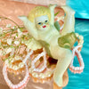 Hand-Painted Ceramic Cheerful Cherub Figurine