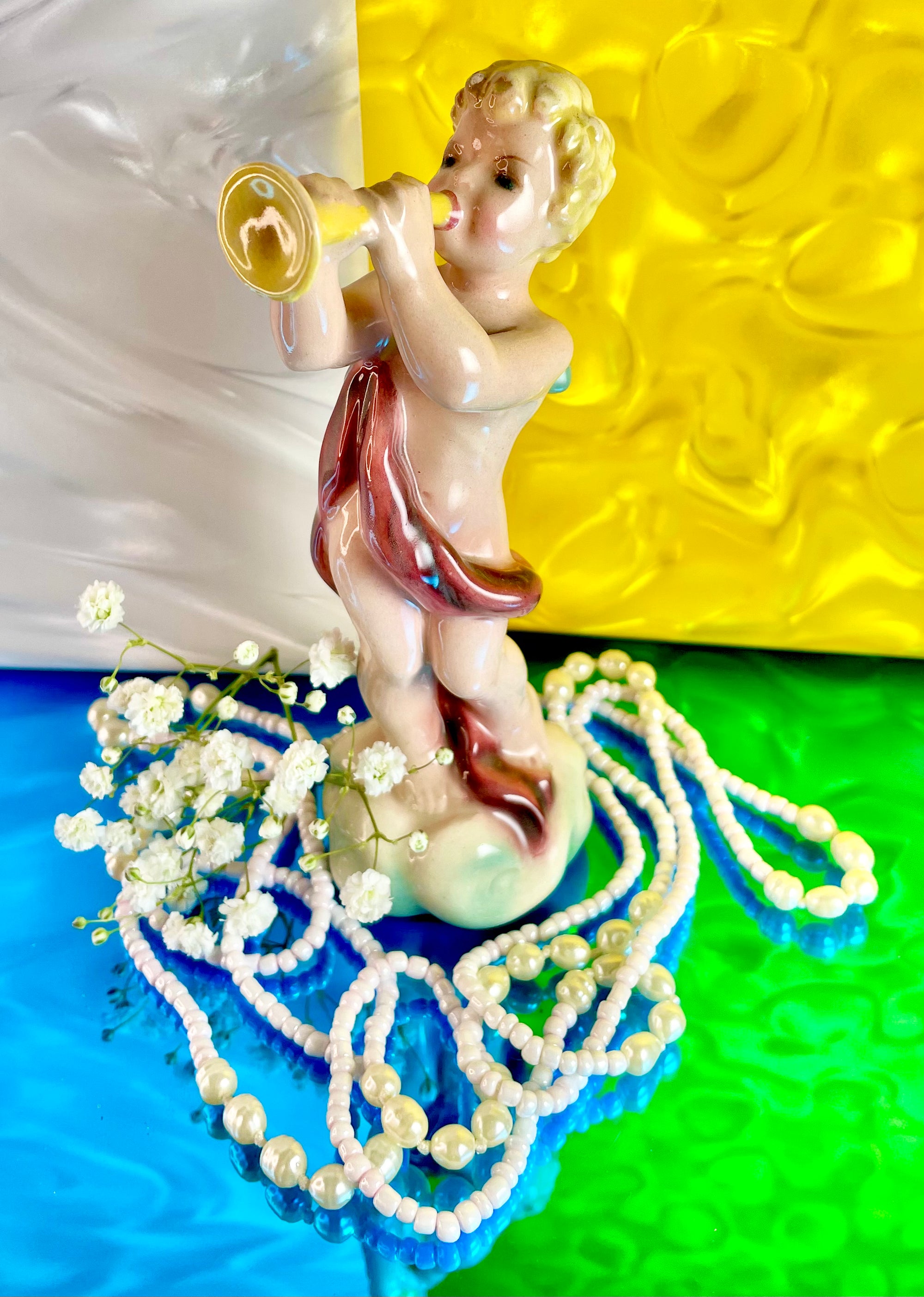 Porcelain Cherub and Trumpet