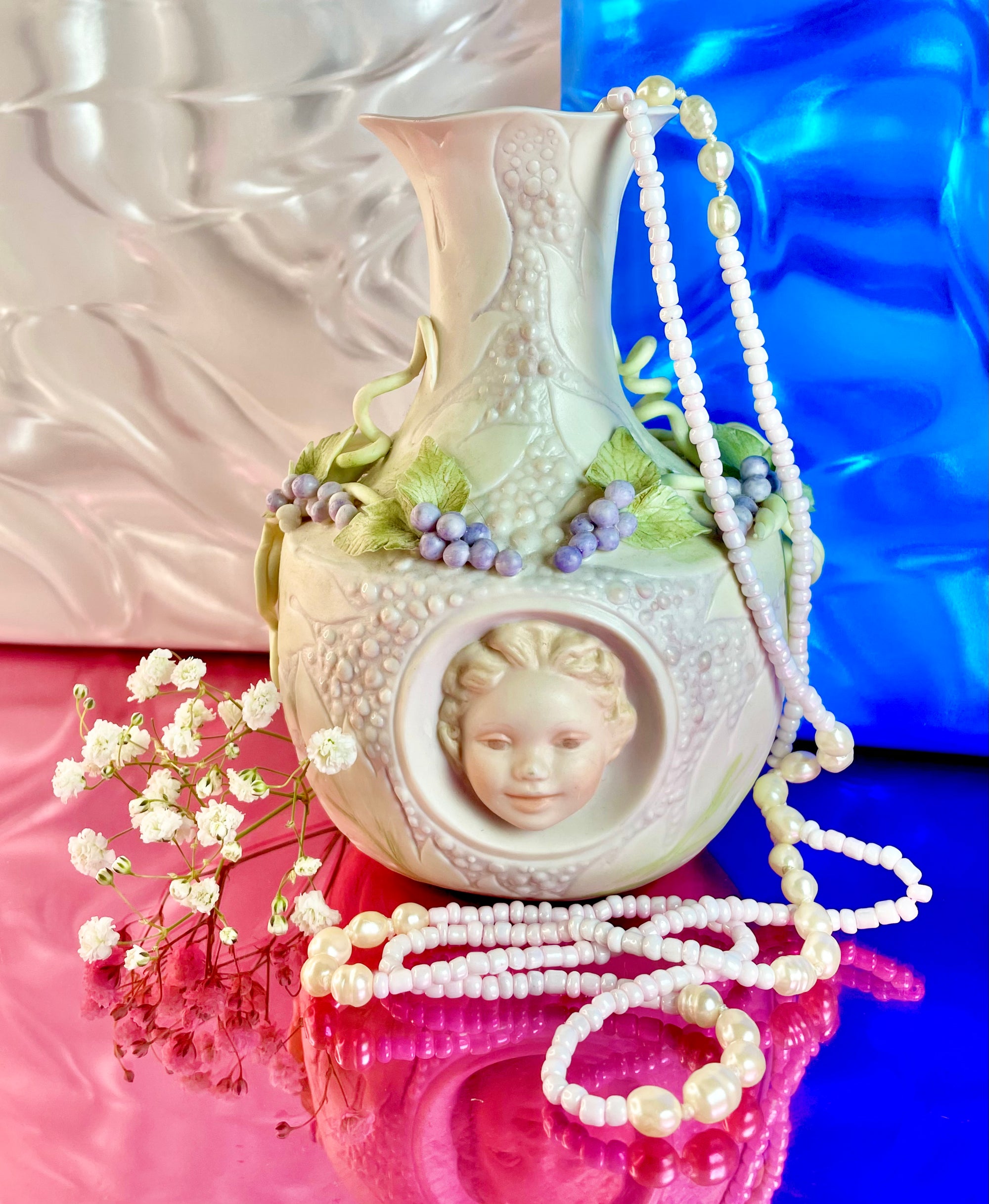 Porcelain Grape and Cherub Bottle Vase